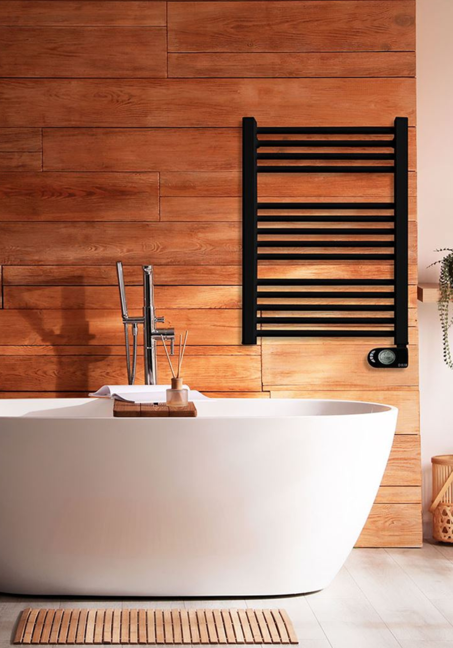 HJM NOOR electric towel radiator UK installed in a modern bathroom, showcasing stylish Spanish design and efficient towel heating.